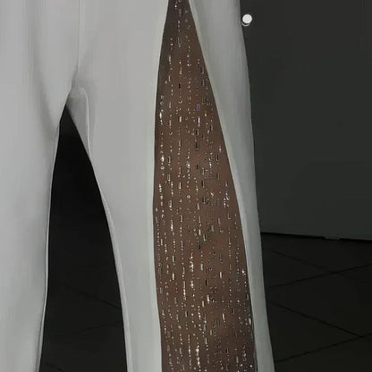 Jumpsuit de un solo hombro con mangas acampanadas de malla